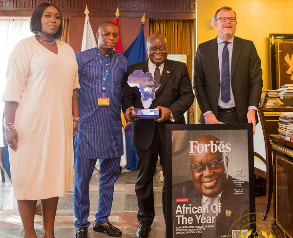 President presented with Forbes award President presented with Forbes award