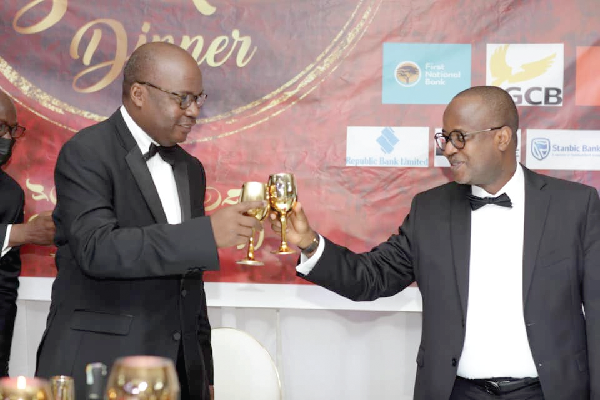 Dr Ernest Addison (left), Governor, BoG, having a toast with his deputy, Dr Maxwell Opoku-Afari Dr Ernest Addison (left), Governor, BoG, having a toast with his deputy, Dr Maxwell Opoku-Afari