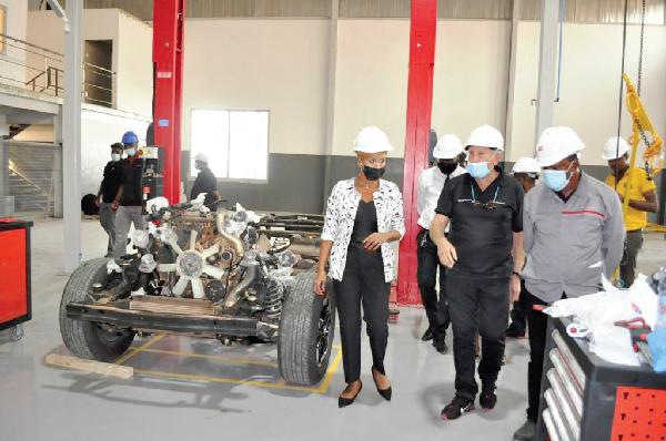 Ms Grace Jeanet Mason (left), South African High Commissioner to Ghana, being taken on a tour by officials of Japan Motors Ms Grace Jeanet Mason (left), South African High Commissioner to Ghana, being taken on a tour by officials of Japan Motors