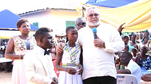 Former President Rawlings with some children at a durbar. Flt Lt J.J. Rawlings, a towering figure in Ghana’s politics