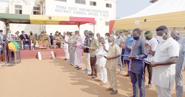 Mr Joseph McAli Junior (arrowed) District Magistrate, Tema, swearing in councillors of the Tema East Sub-Metropolitan District Council Mr Joseph McAli Junior (arrowed) District Magistrate, Tema, swearing in councillors of the Tema East Sub-Metropolitan District Council