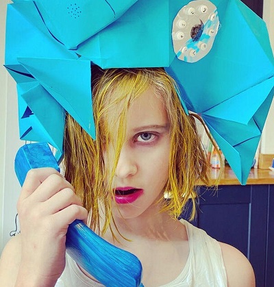 Pearl has reproduced Lady Gaga's outfit from her hit Telephone Bath schoolgirl dresses-up for Save The Children