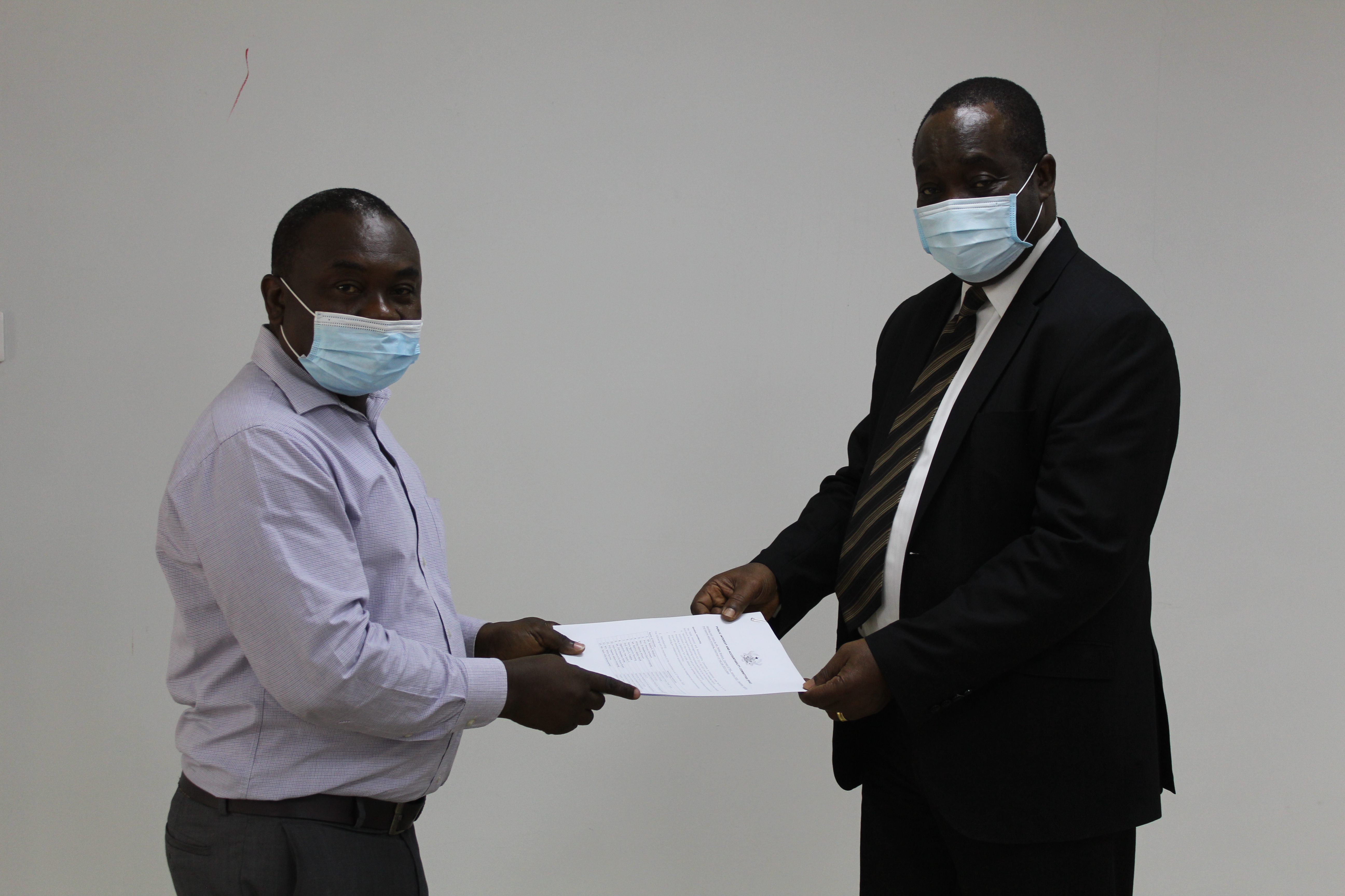Prof Kwame Adom- Frimpong (right), Chairman of the Public Interest and Accountability Committee (PIAC) receiving the handing over notes from Mr Noble Wadzah, Outgone Chairman of PIAC. Prof Kwame Adom- Frimpong (right), Chairman of the Public Interest and Accountability Committee (PIAC) receiving the handing over notes from Mr Noble Wadzah, Outgone Chairman of PIAC.