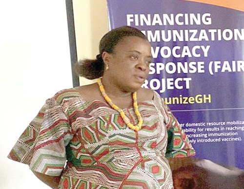 Nancy Ansah (inset), Director of Programmes of the Hope for Future Generations, speaking at the meeting