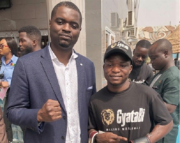Wasiru 'Gyatabi' Mohammed (right) with his manager John Manfo in happier times