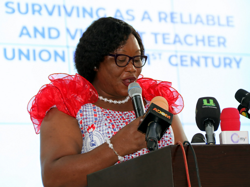 Mrs Philippa Larsen -The National President of GNAT, addressing the delegates at the conference. Mrs Philippa Larsen -The National President of GNAT, addressing the delegates at the conference.
