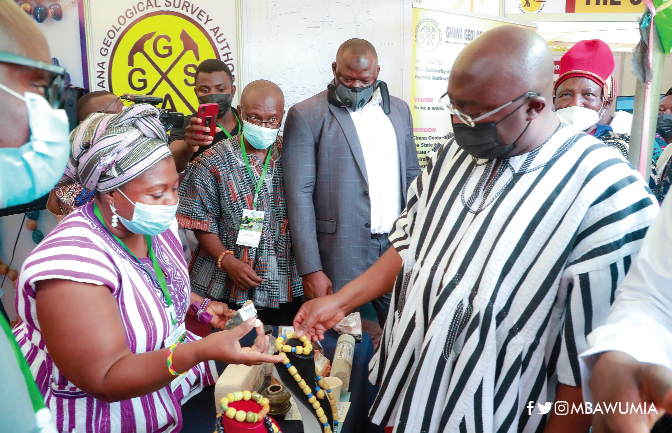 Vice-President Mahamudu Bawumia (right) admiring some beads on display at the exhibition