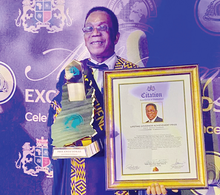 Prof Kwesi Yankah, former Minister of State in charge of Tertiary Education, displaying his award and the citation Prof Kwesi Yankah, former Minister of State in charge of Tertiary Education, displaying his award and the citation