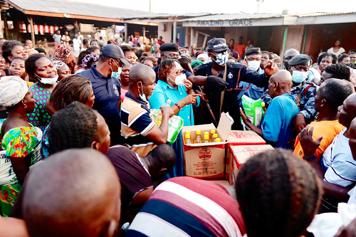 •Madam Mavis Hawa Koomson (arrowed) addressing the fishermen at a fishing community during the distribution of the relief items •Madam Mavis Hawa Koomson (arrowed) addressing the fishermen at a fishing community during the distribution of the relief items