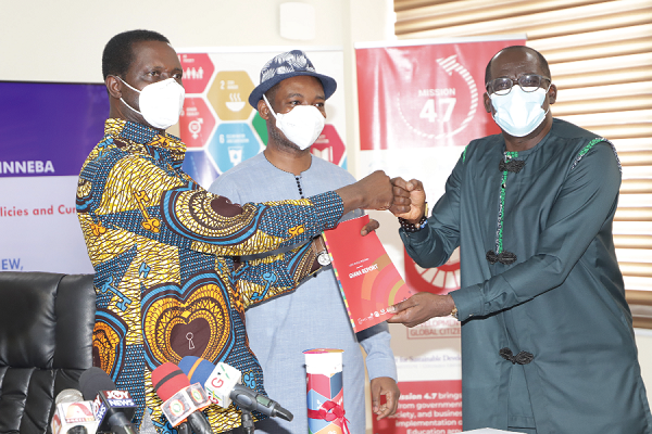 Prof. Andy Ofori- Birikorang (right), Pro Vice- Chancellor, University of Education, Winneba (UEW), presenting the Global School Programmme-Ghana Report to Dr. Yaw Osei Adutwum (left), Minister of Education, during the meeting. With them is Chief Nat Ebo Nsarko (2nd right), Executive Director, Millennium Promise Alliance (MPA). Prof. Andy Ofori- Birikorang (right), Pro Vice- Chancellor, University of Education, Winneba (UEW), presenting the Global School Programmme-Ghana Report to Dr. Yaw Osei Adutwum (left), Minister of Education, during the meeting. With them is Chief Nat Ebo Nsarko (2nd right), Executive Director, Millennium Promise Alliance (MPA).