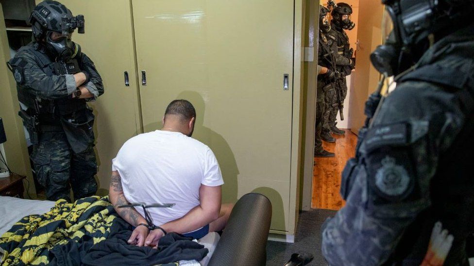 image captionMore than 200 people were arrested in Australia image captionMore than 200 people were arrested in Australia