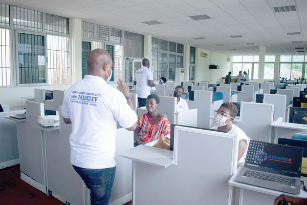  Some facilitators of Mamdev Ghana Limited explaining issues to the partcipants