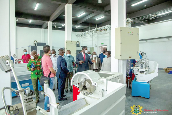 • Dr Yaw Osei Adutwum (arrowed), Minister of Education, holding discussions with officials of the university during the tour