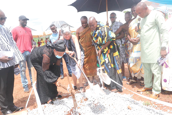 • Ms Kimberli Brackett (arrowed), Founder of KPK, flanked by Nana Amoateng Tuffuor (in Kente), Ankobeahene of Tepa, and Mrs Matina Appiah-Nyantatyi, MCE of Tepa, during the sod-cutting ceremony at Tepa. • Ms Kimberli Brackett (arrowed), Founder of KPK, flanked by Nana Amoateng Tuffuor (in Kente), Ankobeahene of Tepa, and Mrs Matina Appiah-Nyantatyi, MCE of Tepa, during the sod-cutting ceremony at Tepa.
