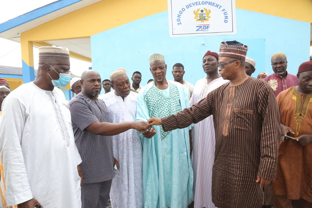 Dr Arafat Sulemana Abdulai (r) handing over keys to a six-unit fully furnished school block to Mr Seth Birimkorang, DCE for Denkyeambour. Looking on are chiefs and Imams of Boadua. Insert is the pictures of the school block. Dr Arafat Sulemana Abdulai (r) handing over keys to a six-unit fully furnished school block to Mr Seth Birimkorang, DCE for Denkyeambour. Looking on are chiefs and Imams of Boadua. Insert is the pictures of the school block.