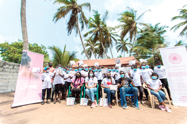 Mrs Menaye Donkor Muntari (seated 2nd left) Chief Executive Officer of Sincerely Ghana Limited with some partners and beneficiaries Campaign to end period poverty launched