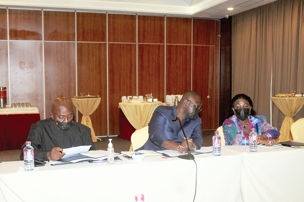Mr Francis Asenso-Boakye (middle), Minister of Works and Housing, interacting with Ms Cecilia Dapaah, Minister of Sanitation and Water Resources, during the Greater Accra Resilient and Integrated Development Project meeting. With them is Mr Dan Botwe (left), Minister of Local Government, Decentralisation and Rural Development. Picture: Maxwell Ocloo