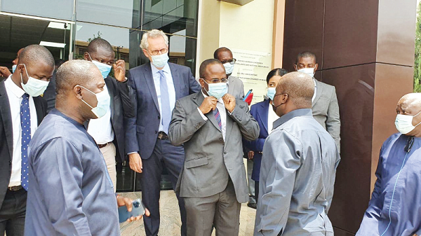 Mr Samuel A. Jinapor, (back at camera), in an interaction with Mr Eric Asubonteng (left), the President of the Chamber of Mines, and Mr Sulemanu Koney (middle).Picture: DELLA RUSSEL OCLOO