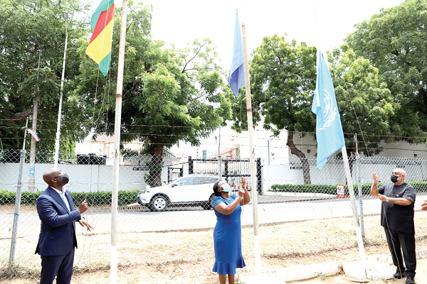 Mr Kojo Oppong Nkrumah (left), Minister of Information, Ms Linda Asante Adjei (middle), Vice-President of the Ghana Journalists Association and Mr Charles Abani (right), UN Resident Co-ordinator in Ghana jointly hoisting the flag to mark the event in Accra GJA commemorates Press Freedom Day