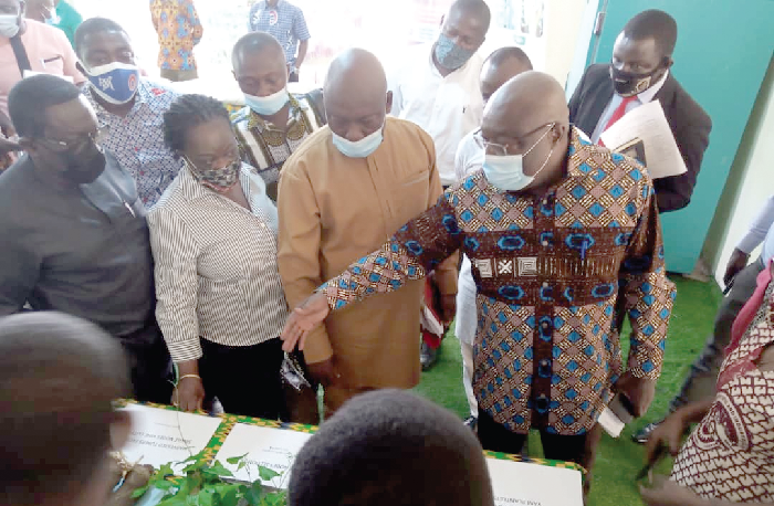 Dr Kwaku Afriyie (right), Minister of Environment, Science, Technology and Innovation, inspecting some of the new yam varieties Dr Kwaku Afriyie (right), Minister of Environment, Science, Technology and Innovation, inspecting some of the new yam varieties