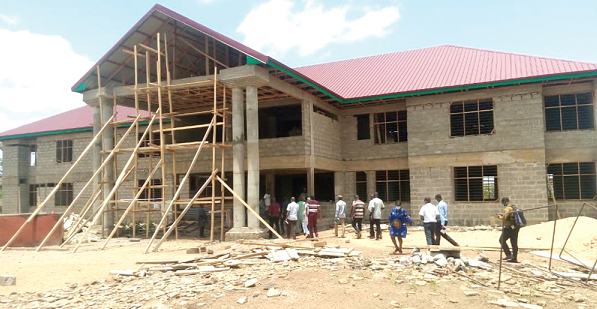 • Members of the Parliamentary Select Committee on Local Government and Rural Development inspecting the office complex of the Tempane District funded under the District Assemblies Common Fund • Members of the Parliamentary Select Committee on Local Government and Rural Development inspecting the office complex of the Tempane District funded under the District Assemblies Common Fund