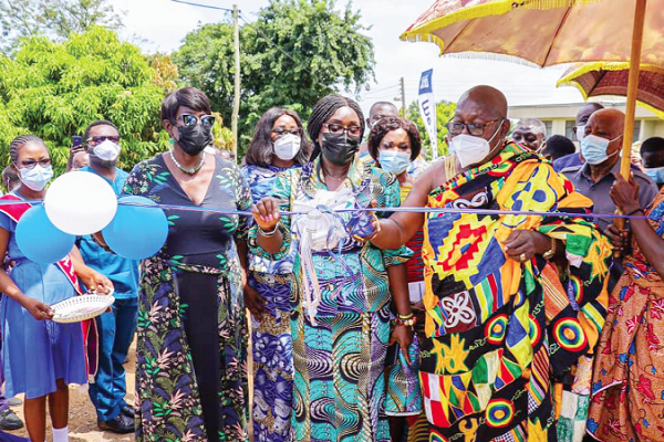 Nana Osei Bosompem III (in Kente), Chief of Jachie and acting President of the Nsuta Traditional Council, cutting the tape to inaugurate the new boys dormitory for the Nsutaman Catholic SHS at Nsuta in the Ashanti Region (above). Pictures: EMMANUEL BAAH Nana Osei Bosompem III (in Kente), Chief of Jachie and acting President of the Nsuta Traditional Council, cutting the tape to inaugurate the new boys dormitory for the Nsutaman Catholic SHS at Nsuta in the Ashanti Region (above). Pictures: EMMANUEL BAAH