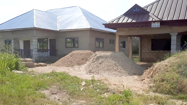 One of the houses built on the encroached land of the STU One of the houses built on the encroached land of the STU