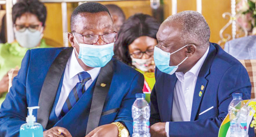 Mr Patrick Owusu (right), Board Chairman, conferring with Dr Stephen Sarfo Kantanka, CEO of the bank, during the meeting Mr Patrick Owusu (right), Board Chairman, conferring with Dr Stephen Sarfo Kantanka, CEO of the bank, during the meeting