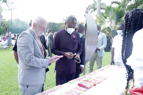 Mr Jeroen Verheul (left), Netherlands Ambassador to Ghana, and Mr Joseph Boahen Aidoo (right), Chief Executive Officer, COCOBOD, examining some cocoa products during an exhibition at the event. Picture: EDNA SALVO-KOTEY Mr Jeroen Verheul (left), Netherlands Ambassador to Ghana, and Mr Joseph Boahen Aidoo (right), Chief Executive Officer, COCOBOD, examining some cocoa products during an exhibition at the event. Picture: EDNA SALVO-KOTEY