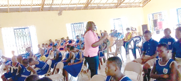 Ms Rebecca Ametepey, a nurse at the Kpong Ensign College of Public Health, addressing the pupils Ms Rebecca Ametepey, a nurse at the Kpong Ensign College of Public Health, addressing the pupils