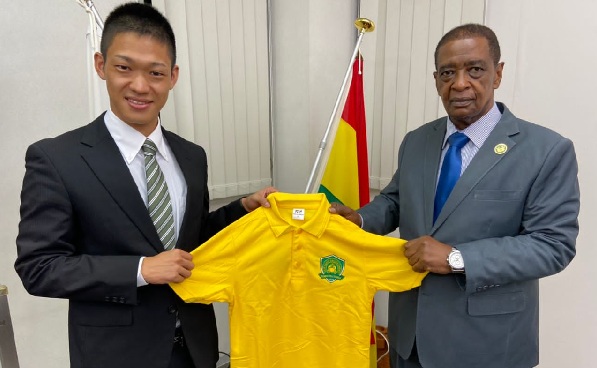 Jindo Morishita (left) presenting an Ebusua Dwarfs branded shirt to H.E Frank Okyere Jindo Morishita (left) presenting an Ebusua Dwarfs branded shirt to H.E Frank Okyere