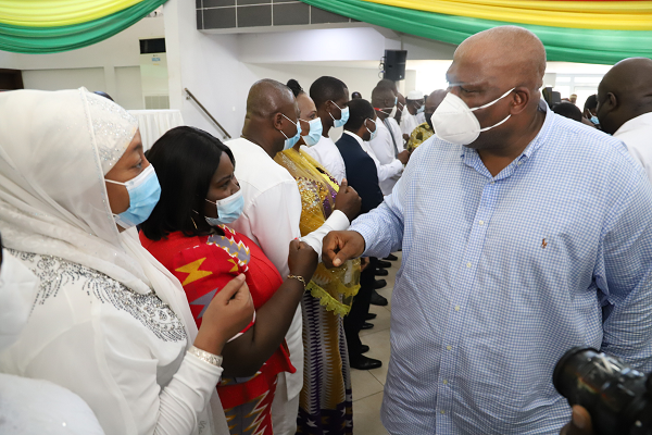 Mr Henry Quartey (right) exchanging pleasantries with the newly elected MMDCEs after the swearing-in ceremony in Accra. Picture: GABRIEL AHIABOR Mr Henry Quartey (right) exchanging pleasantries with the newly elected MMDCEs after the swearing-in ceremony in Accra. Picture: GABRIEL AHIABOR