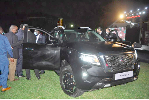  Mr Joseph Siaw Agyapong (arrowed) and some executive of JMTC inspecting the new Navara Pickup