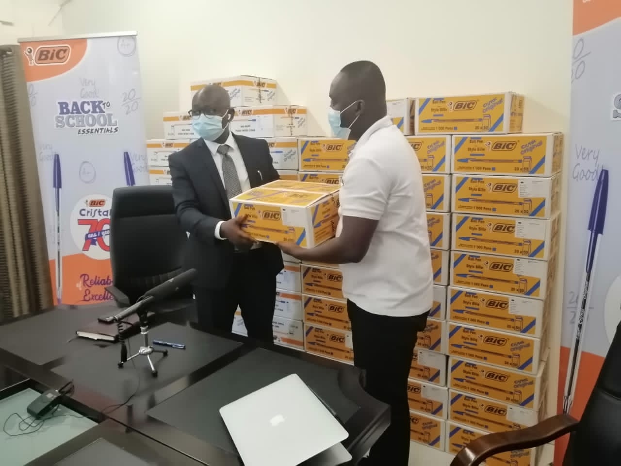 • Professor Kwesi Opoku Amankwa, Director General of GES receiving BIC donates pens to BECE candidates