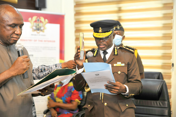 Mr Ambrose Dery (left), Minister for the Interior admistering the Oath of office to Mr Isaac Kofi Egyir, Director-General of the Ghana Prisons Service. Picture: EMMANUEL QUAYE Mr Ambrose Dery (left), Minister for the Interior admistering the Oath of office to Mr Isaac Kofi Egyir, Director-General of the Ghana Prisons Service. Picture: EMMANUEL QUAYE