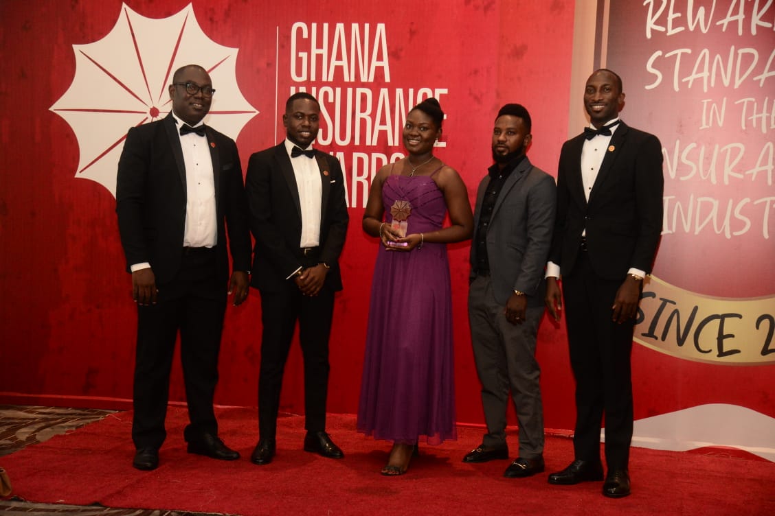 The team from BIMA with the award BIMA wins Mobile Insurance Leadership Award for 4th time