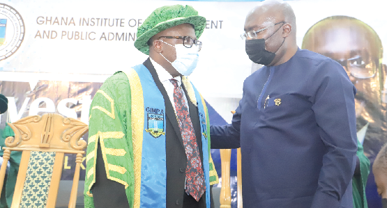 Vice-President Dr Mahamudu Bawumia (right) congratulating Prof. Samuel Kwaku Bonus, Rector, Ghana Institute of Management and Public Administration, after the investiture at Legon. Picture: SAMUEL TEI ADANO Vice-President Dr Mahamudu Bawumia (right) congratulating Prof. Samuel Kwaku Bonus, Rector, Ghana Institute of Management and Public Administration, after the investiture at Legon. Picture: SAMUEL TEI ADANO