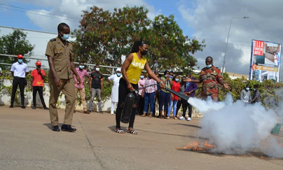 An official of the fire outfit supervising the use of the fire extinguisher. An official of the fire outfit supervising the use of the fire extinguisher.