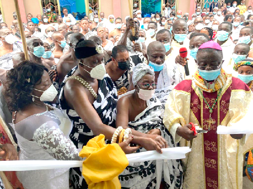 Nana Otuo Siriboe II (2nd left), the Juabenhene and Nana Akosua Akyiamaa II (2nd right) the Juabenhemaa, being assisted by Most Rev. Osei-Bonsu (right) to cut the tape to inaugurate the new Sunday school chapel for the St Stephen’s Catholic Church at Juaben in the Ashanti Region Nana Otuo Siriboe II (2nd left), the Juabenhene and Nana Akosua Akyiamaa II (2nd right) the Juabenhemaa, being assisted by Most Rev. Osei-Bonsu (right) to cut the tape to inaugurate the new Sunday school chapel for the St Stephen’s Catholic Church at Juaben in the Ashanti Region