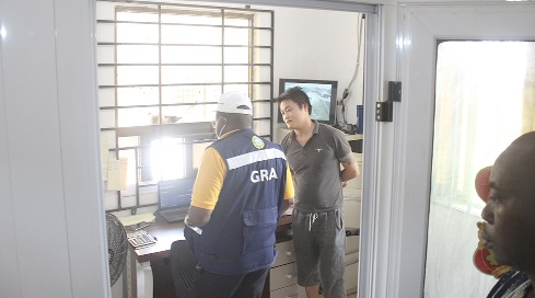  Officials of GRA inspecting the books and tax records of E &amp; A Quarry Limited