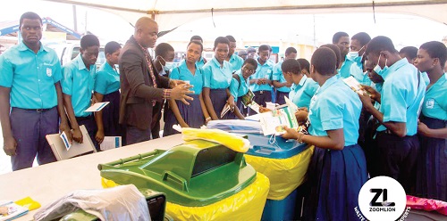 Students who participated in the event being educated on some of the useful products from plastic waste