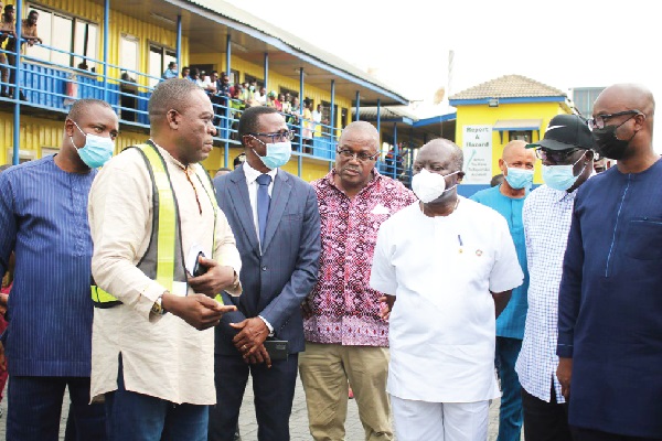 David Songotu (2nd from left), Terminal Manager of GPHA's Reefer Yard, briefing Ken Ofori-Atta (in white) and and his team. They include Rev. Owusu-Amoah (3rd from left), Major Gen. Amanfu (2nd from right) and Mr Asomani (right). PICTURE: DELLA RUSSEL OCLOO Seal revenue leakages at Tema Port - Ofori-Atta charges GRA