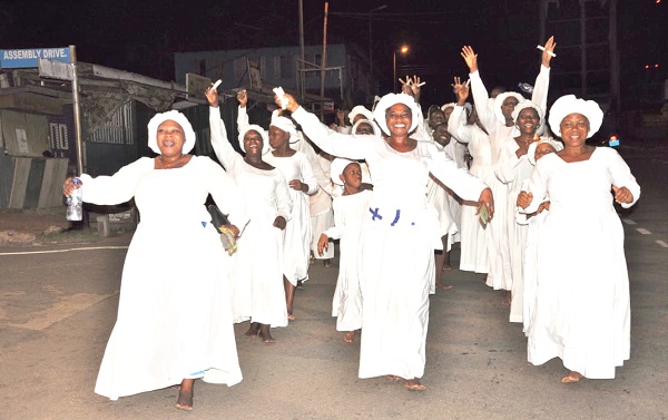 Members of the Celestial Church of Christ reliving the Resurrection in Ho Members of the Celestial Church of Christ reliving the Resurrection in Ho