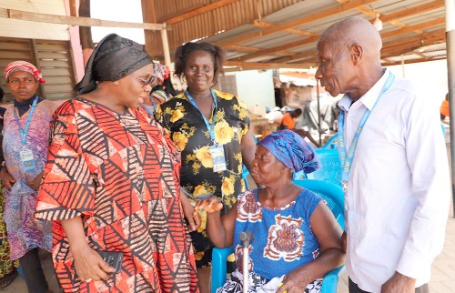 Cecilia Abena Dapaah (left), Caretaker for the Ministry of Gender, Children and Social Protection, having a conversation with some beneficiaries during the LEAP benefit payment at Dakwadwom in Kumasi Cecilia Abena Dapaah (left), Caretaker for the Ministry of Gender, Children and Social Protection, having a conversation with some beneficiaries during the LEAP benefit payment at Dakwadwom in Kumasi