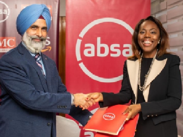 Abena Osei-Poku (right), MD of Absa Bank exchanging the signed documents with Amar Deep Hari, the Chief Executive of IPMC Absa, Amazon sign pact to lead cloud computing transformation
