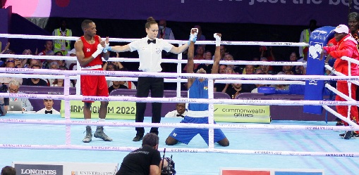 Joseph Commey (right) was too strong for his opponent Joseph Commey (right) was too strong for his opponent