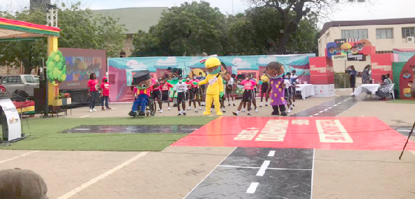 Some of the children joined by the five characters in a dance Some of the children joined by the five characters in a dance