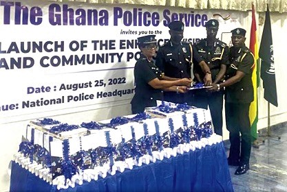 COP Paul Manly Awini (2nd from left), Director-General of the National Patrol Department of the Ghana Police Service, being assisted by other senior police officers to launch the document COP Paul Manly Awini (2nd from left), Director-General of the National Patrol Department of the Ghana Police Service, being assisted by other senior police officers to launch the document