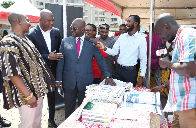 Ato Afful (2nd from left), Managing Director of Graphic Communications Group Limited (GCGL), showing some copies of the Daily Graphic to Francis Asenso-Boakye (3rd from left), Minister of Works and Housing, at the Graphic Stand at the GREDA-Graphic Housing Fair in Accra. Those with him are Patrick Ebo Bonful (left), President of GREDA; Lelia Pentsil (3rd from right), Communications Manager, Republic Bank, and Derrick Abeiku Hanson (right), Assistant Sales and Circulation Manager of GCGL. Picture: EBOW HANSON Ato Afful (2nd from left), Managing Director of Graphic Communications Group Limited (GCGL), showing some copies of the Daily Graphic to Francis Asenso-Boakye (3rd from left), Minister of Works and Housing, at the Graphic Stand at the GREDA-Graphic Housing Fair in Accra. Those with him are Patrick Ebo Bonful (left), President of GREDA; Lelia Pentsil (3rd from right), Communications Manager, Republic Bank, and Derrick Abeiku Hanson (right), Assistant Sales and Circulation Manager of GCGL. Picture: EBOW HANSON