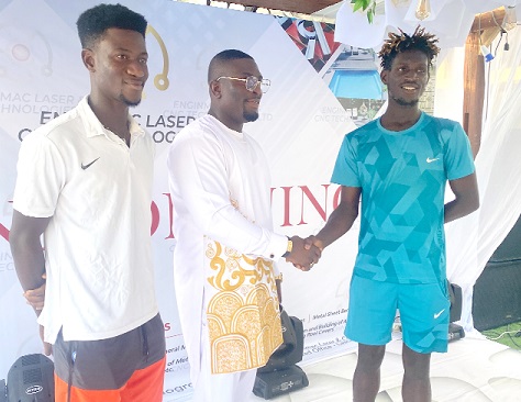 Japheth Bagerbaseh (left) and Johnson Acquah (right) with an official of Enginmac Laser and CNC Technologies Limited